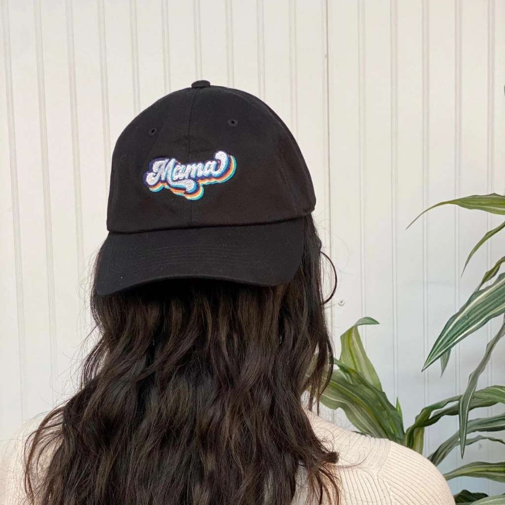 Model wearing baseball hat with Mama embroidered in a retro font - DSY Lifestyle