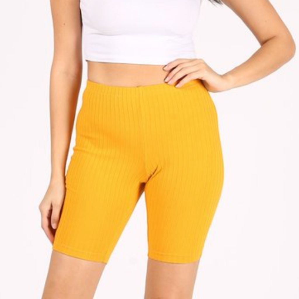 Model wearing mustard ribbed biker shorts - DSY Lifestyle