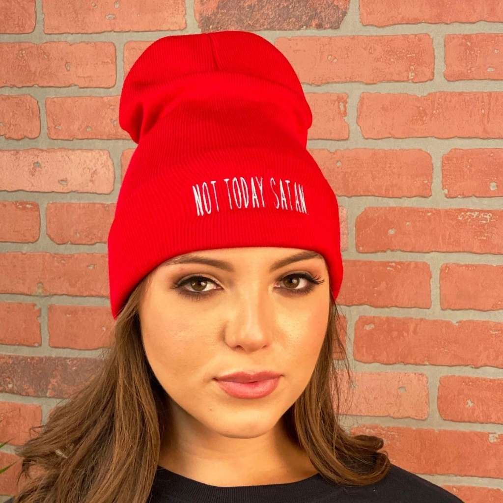 Model wearing Red cuffed beanie embroidered with NOT TODAY SATAN in white - DSY Lifestyle