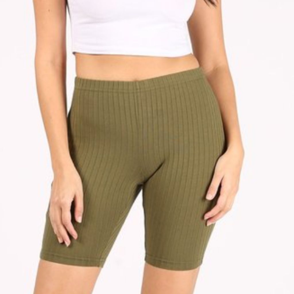 Model wearing olive ribbed biker shorts - DSY Lifestyle