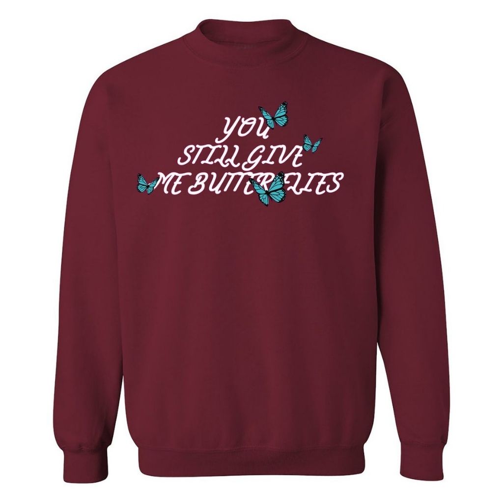 Marooon sweatshirt with 4 blue butterflies and You still give me butterflies printed in the front in white - DSY Lifestyle