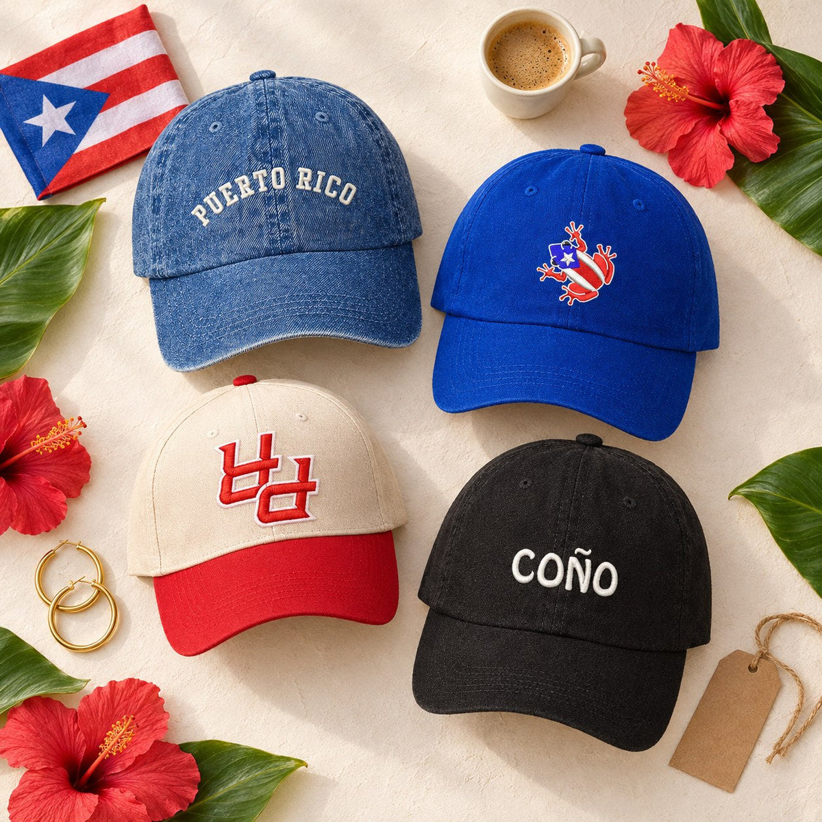 Flat lay of four Puerto Rico hats: denim PUERTO RICO cap, royal blue coquí flag cap, cream and red PR trucker and black COÑO cap, with a Puerto Rico flag, cafecito and hibiscus flowers
