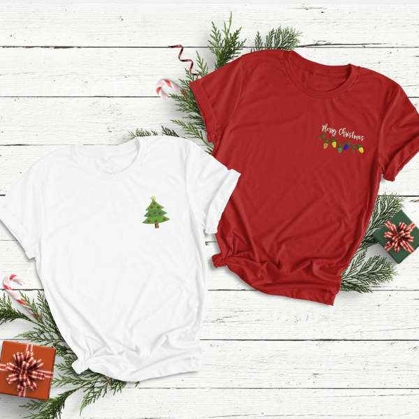 Red embroidered Merry Christmas T-shirt and a white t-shirt embroidered with a Christmas Tree