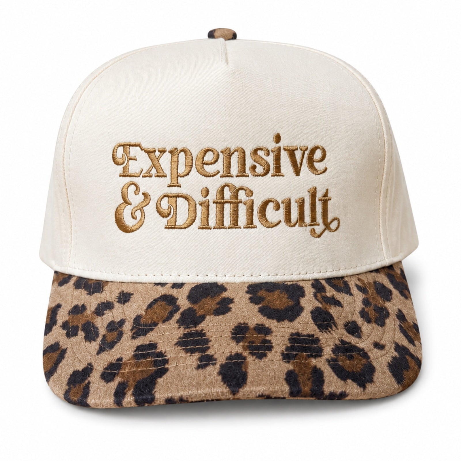 Natural five-panel trucker hat with a leopard bill and Expensive and Difficult embroidered in gold