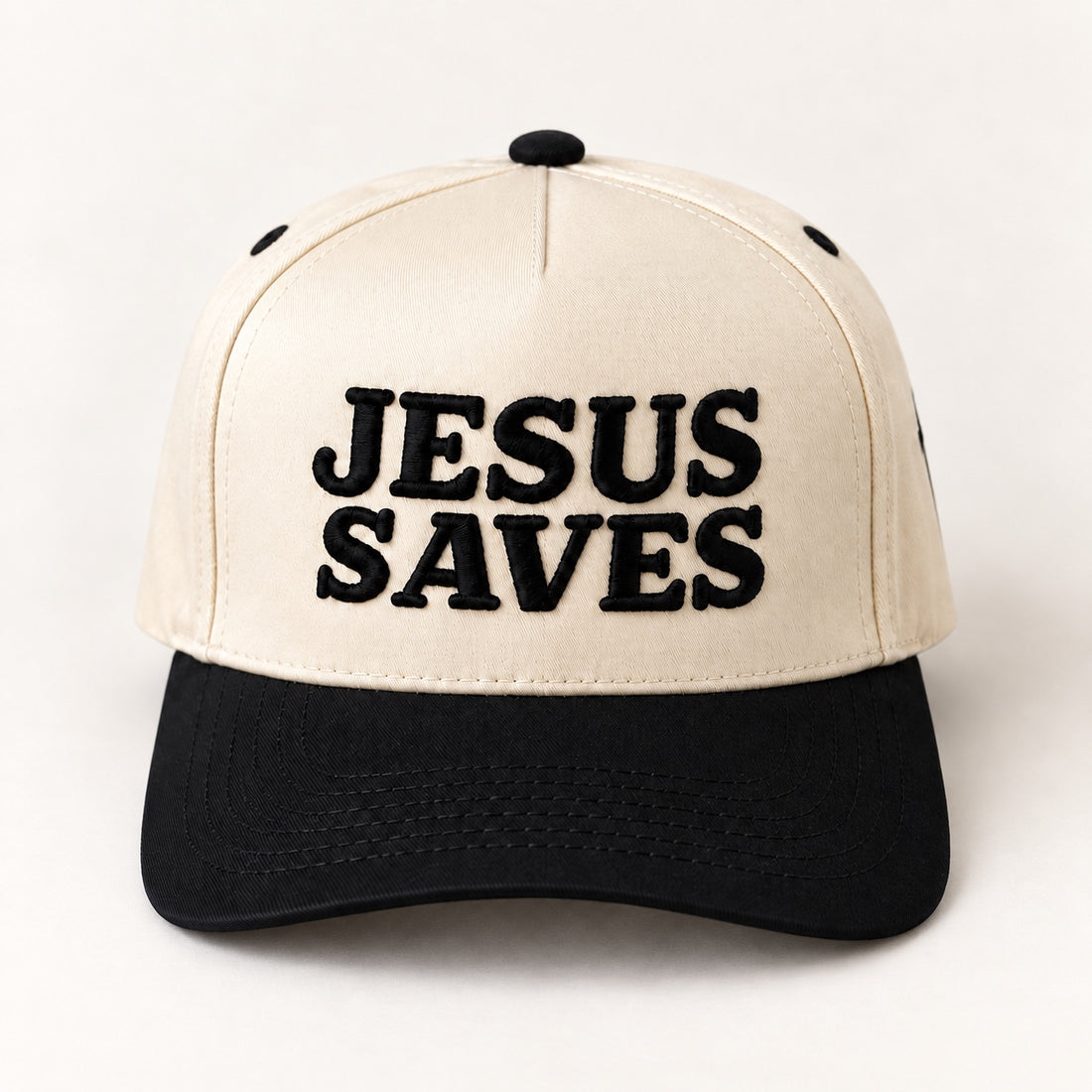 Jesus Saves natural and black five-panel trucker hat on a white background