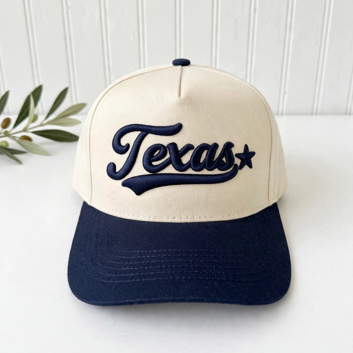 Texas 3D Star trucker hat in Natural / Navy Blue Bill with raised navy Texas script, swoosh, and star embroidery