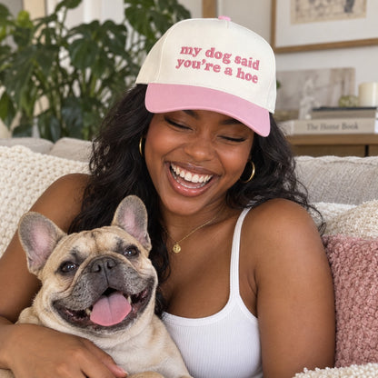 Woman on a couch with a French bulldog wearing the My Dog Said You&