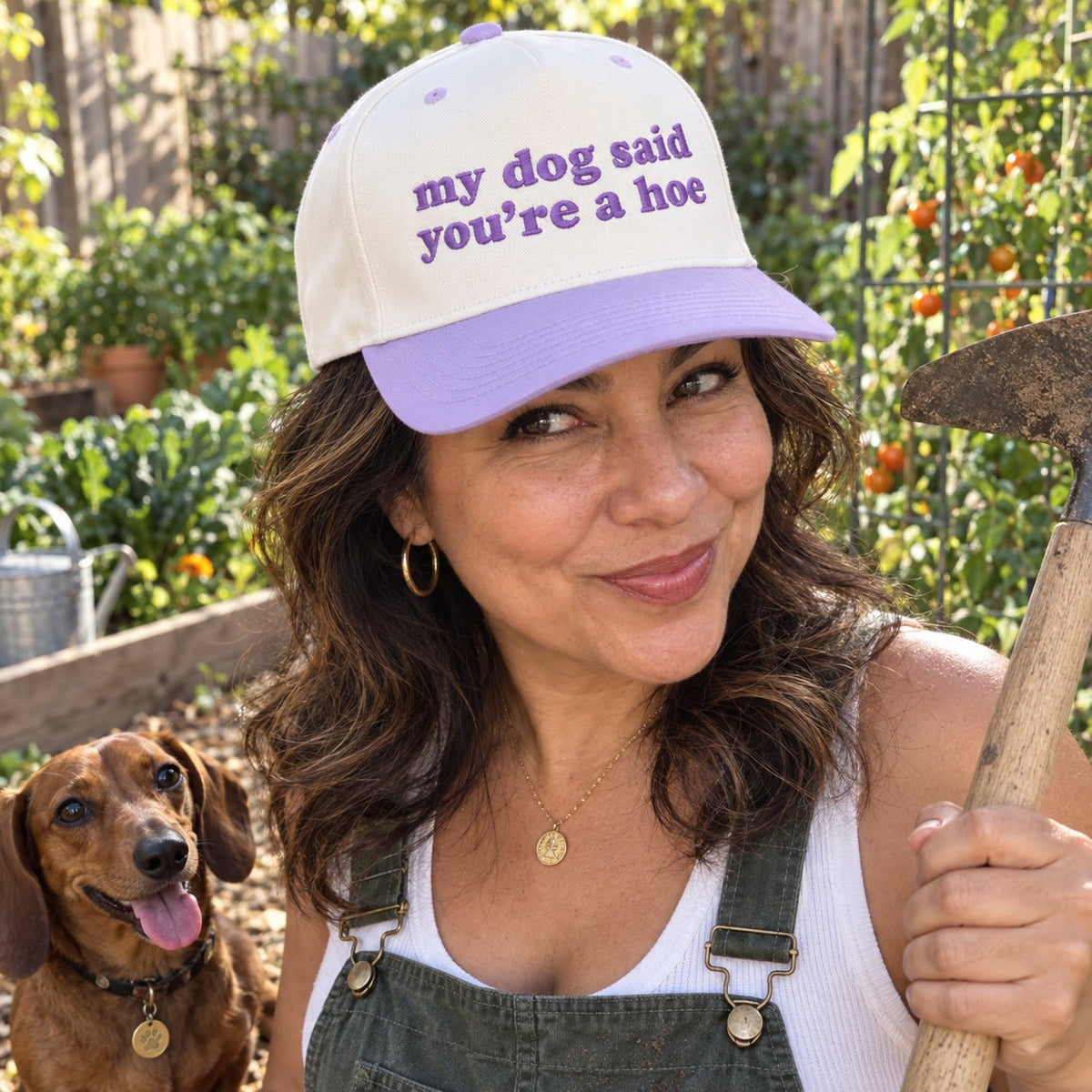 Woman gardening with a dachshund wearing the My Dog Said You&