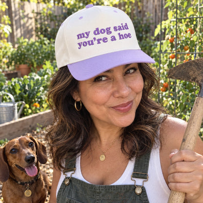 Woman gardening with a dachshund wearing the My Dog Said You&