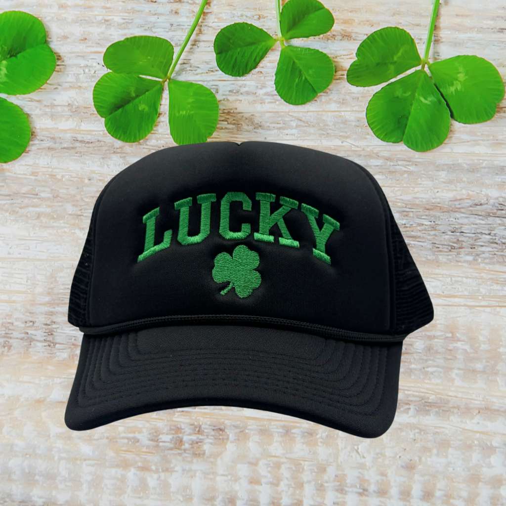 Black foam trucker hat embroidered with Lucky in green and a four leaf clover - DSY Lifestyle
