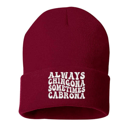 A cozy knit burgundy beanie embroidered with Always Chingona, Sometimes Cabrona, perfect for bold Spanglish style and fierce winter vibes - DSY Lifestyle