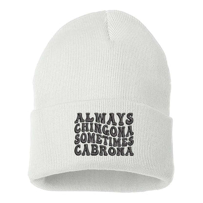 A cozy knit white beanie embroidered with Always Chingona, Sometimes Cabrona, perfect for bold Spanglish style and fierce winter vibes - DSY Lifestyle