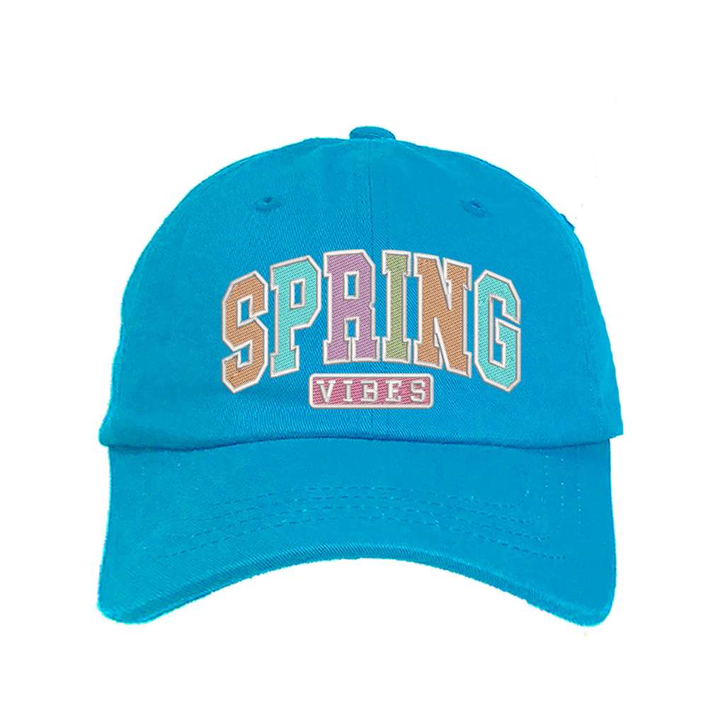 Aqua baseball hat embroidered with the phrase spring vibes on it- DSY Lifestyle
