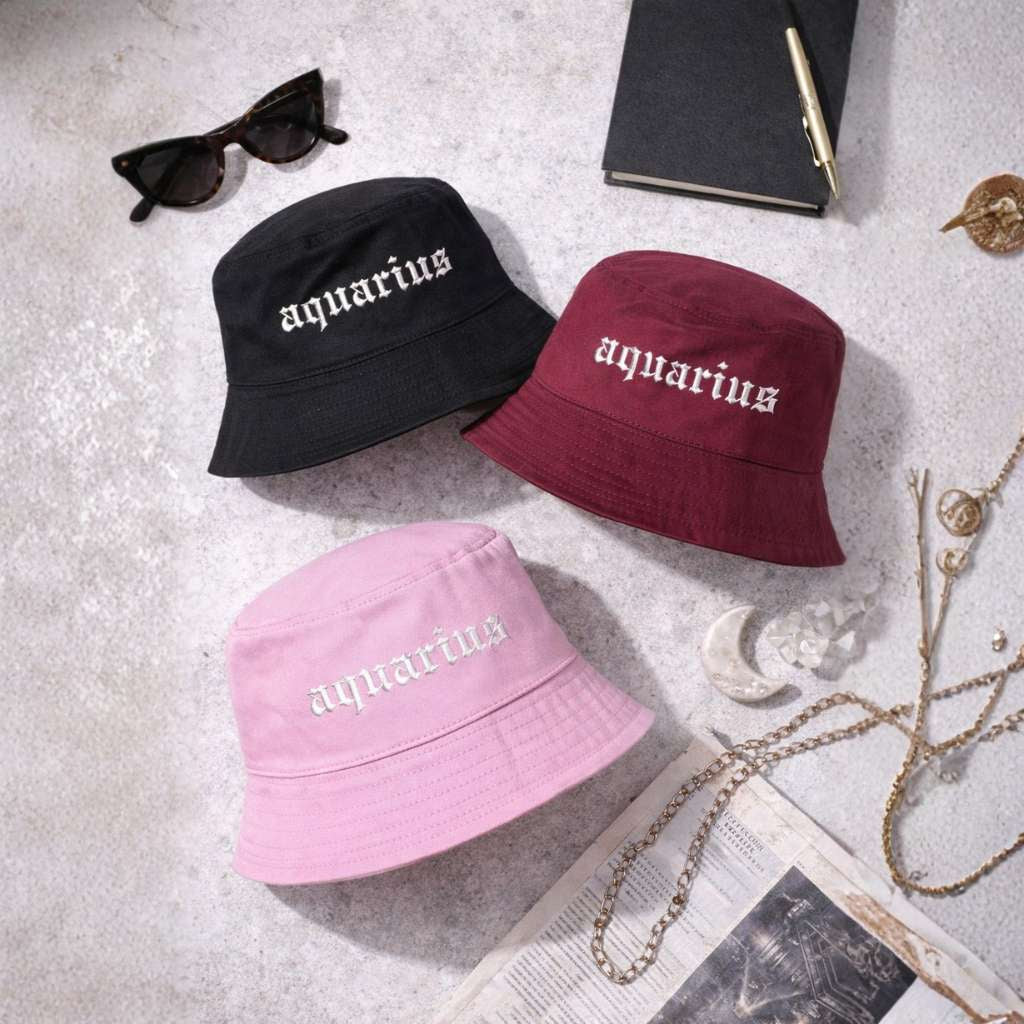 Flat lay of Aquarius Bucket hats- DSY Lifestyle