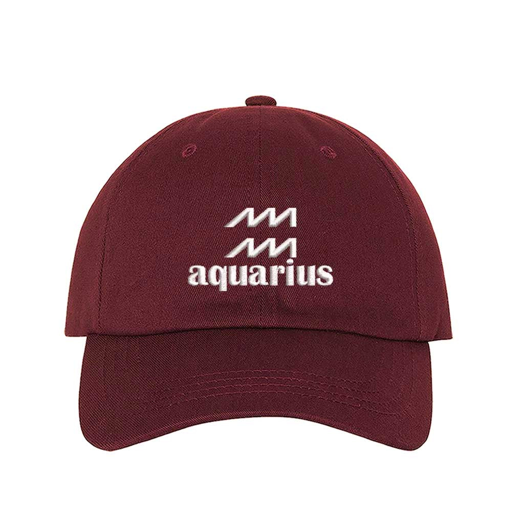 Burgundy Aquarius Symbol Embroidered Baseball Hat, a zodiac-inspired statement hat for expressive, confident everyday style. DSY Lifestyle.
