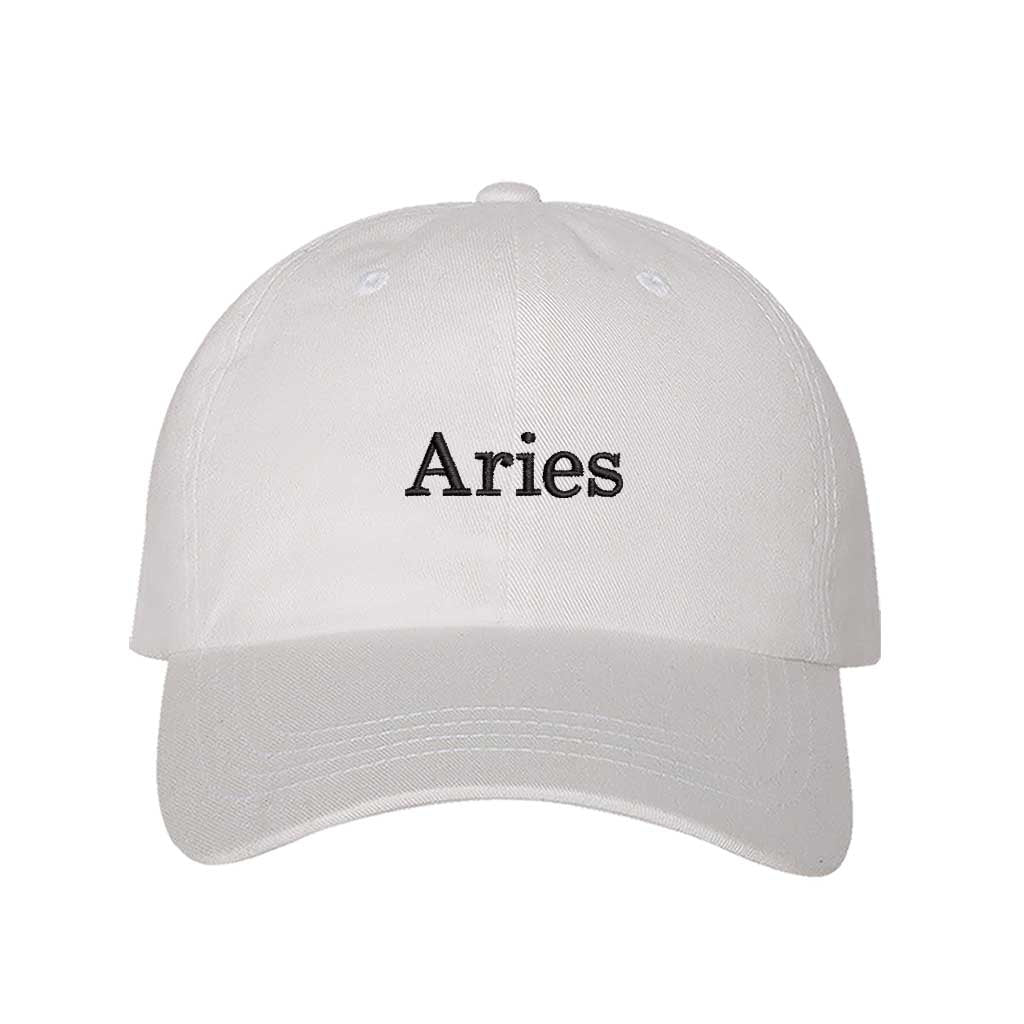White Aries Zodiac Embroidered Baseball Hat featuring sharp black embroidery on a premium cotton crown; a sophisticated astrological statement piece by DSY Lifestyle.