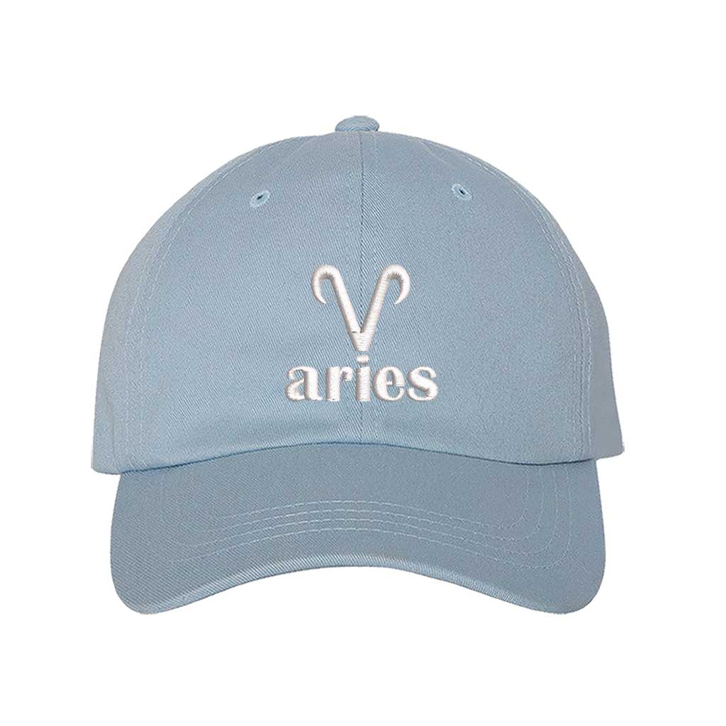 Sky Blue Aries Symbol Embroidered Baseball Hat featuring a sharp white embroidered Ram glyph on a premium cotton crown; a minimalist zodiac statement by DSY Lifestyle.