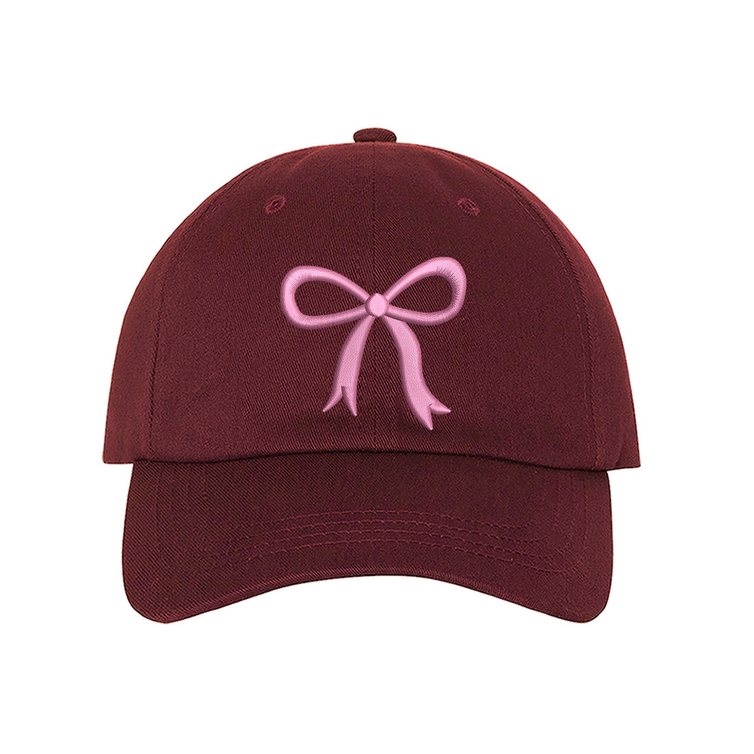 Burgundy Bow Baseball Hat featuring a dainty pink embroidered bow on a classic cap, perfect for a coquette-style outfit or a feminine statement accessory.
