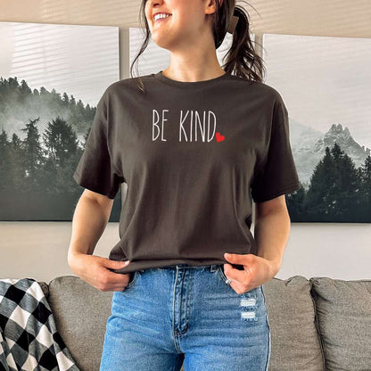 Female wearing a brown oversized unisex t-shirt embroidered with Be Kind and a heart - DSY Lifestyle