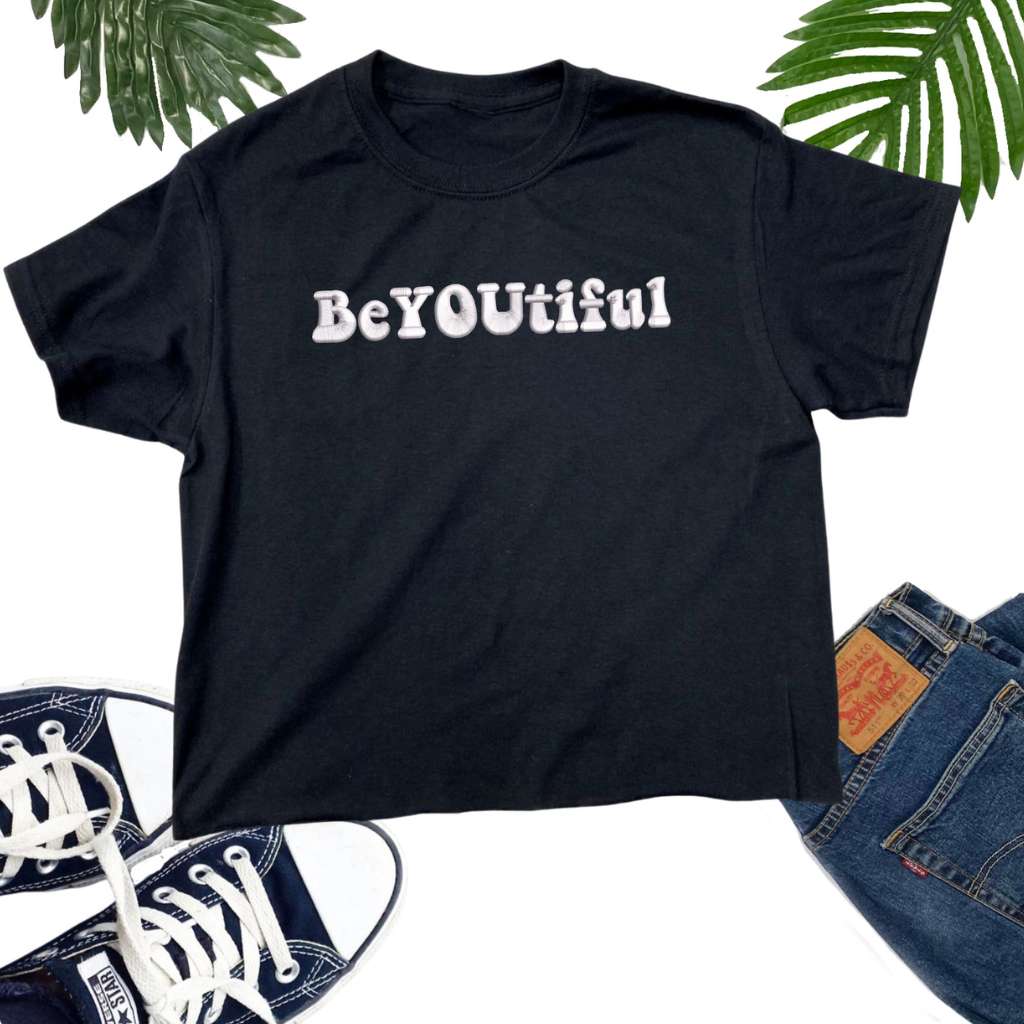 Flay lay of a Black Crop Top embroidered with BeYoutiful - DSY Lifestyle