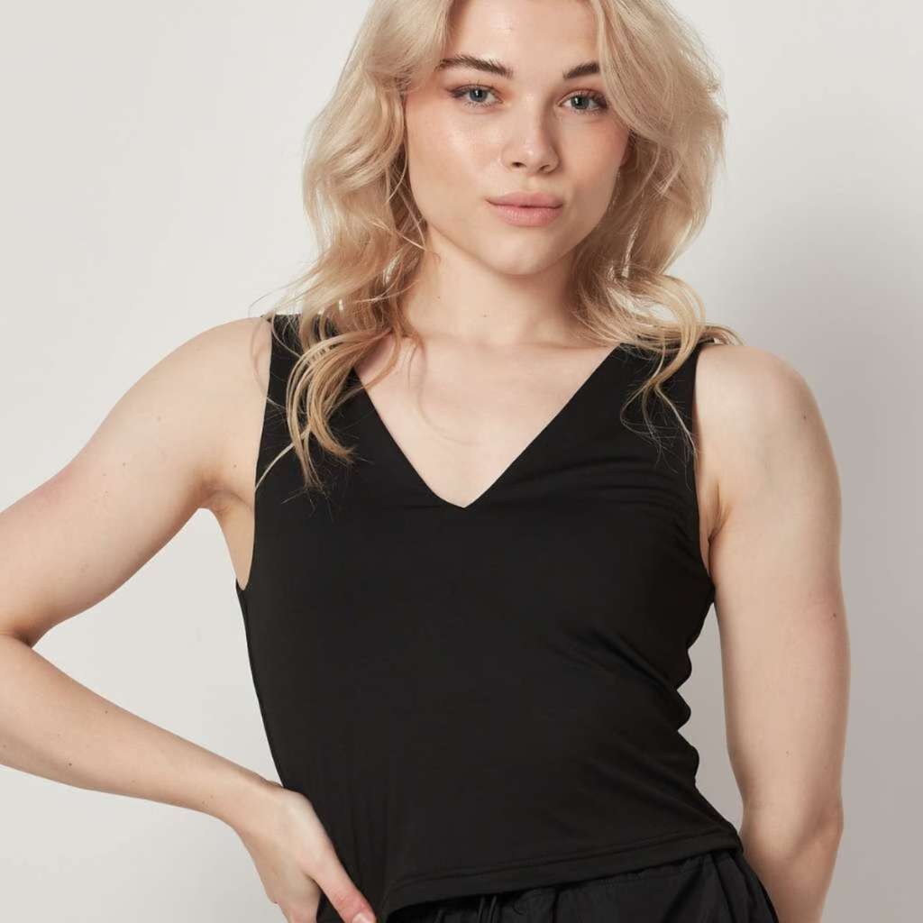 Women wearing a black vneck top - DSY Lifestyle