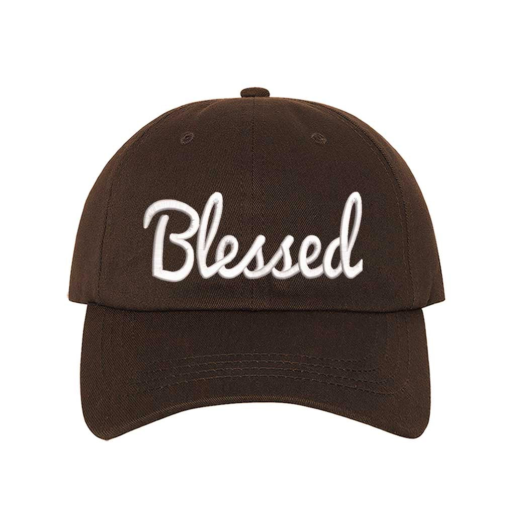 Brown detailed close-up of the premium thread embroidery showing the clean lines of the word Blessed on a textured fabric. - DSY Lifestyle 