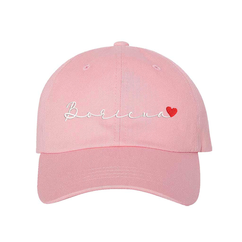 Light Pink embroidered baseball hat with &quot;Boricua&quot; stitched in cursive and a small heart accent, symbolizing Puerto Rican pride and love - DSY Lifestyle 