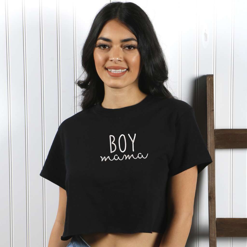 Female wearing a black crop top embroidered with Boy Mama- DSY Lifestyle