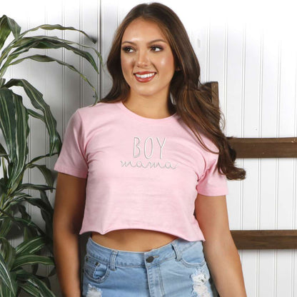 Female wearing a light pink crop top embroidered with Boy Mama- DSY Lifestyle