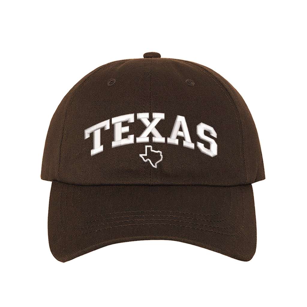 Brown baseball hat embroidered with the word texas and a small map of texas underneath the word- DSY Lifestyle