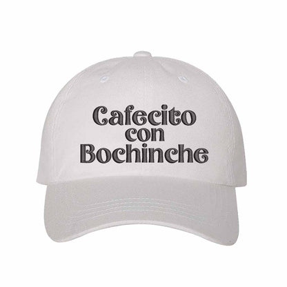 White with black thread Cafecito con Bochinche Embroidered Baseball Hat featuring premium embroidery, adjustable hook and loop closure, and breathable cotton material – DSY Lifestyle