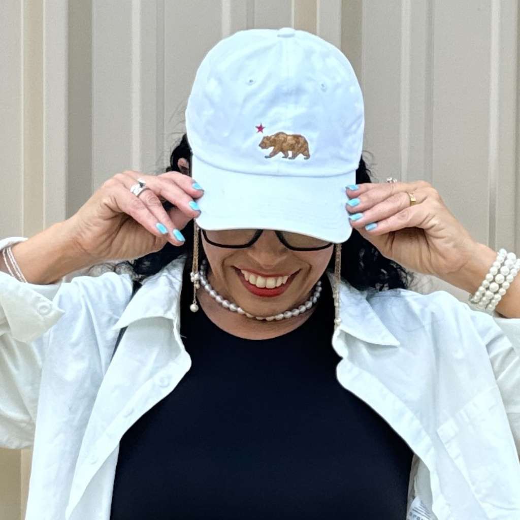 Women Wearing aCali Bear White Baseball Cap