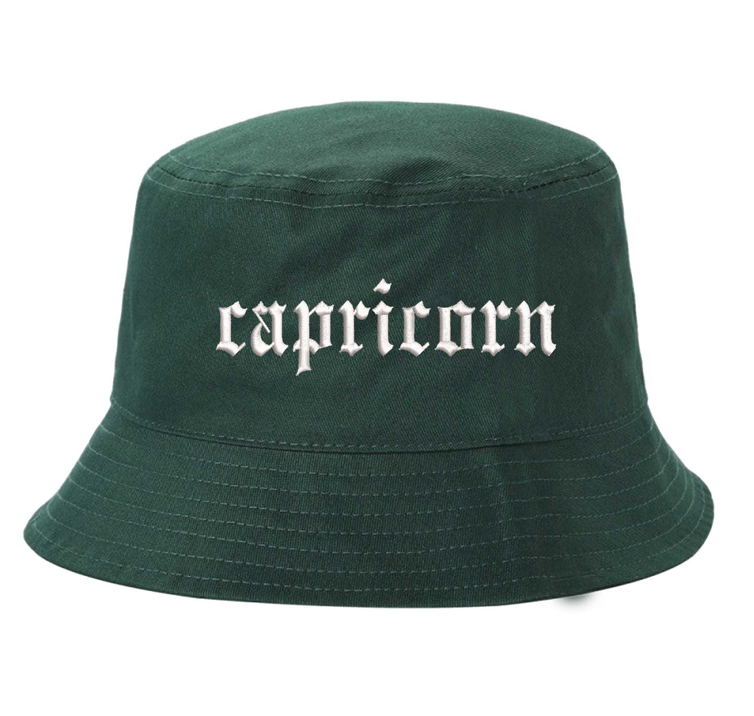 Forest Green Capricorn Bucket Hat, a zodiac statement hat for confident, grounded style with an effortless edge. DSY Lifestyle.
