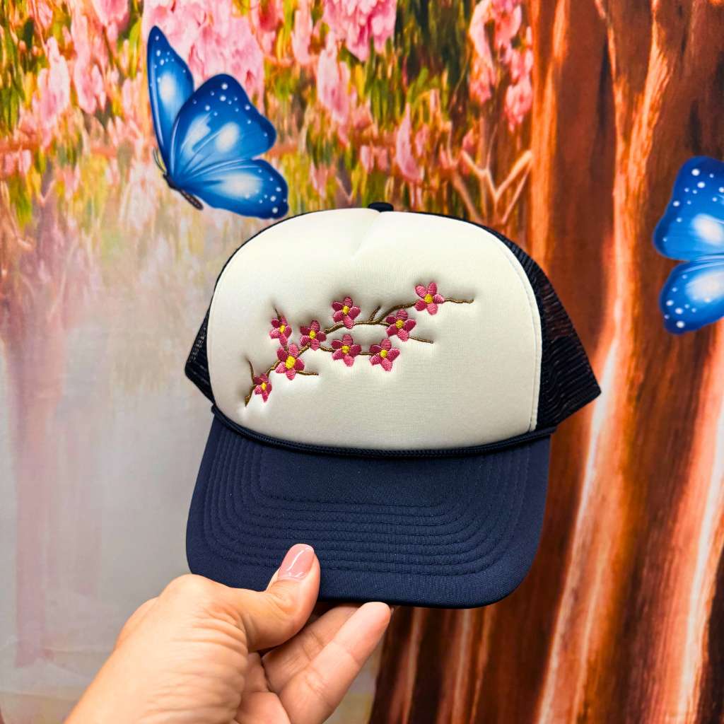 Navy Trucker hat with white front embroidered with cherry blossom - DSY Lifestyle