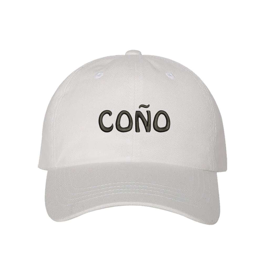 White  baseball cap embroidered with Coño in the front and a Puerto Rico Flag on the back of the hat- DSY Lifestyle
