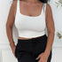 Back view of a white square neck tank top with a clean, seamless finish and cropped cut.

