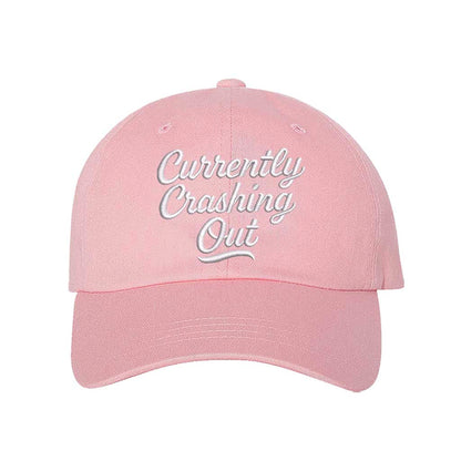 Light Pink Currently Crashing Out embroidered baseball hat. A statement baseball hat for women who love humor, comfort, and effortless everyday outfits. - DSY Lifestyle