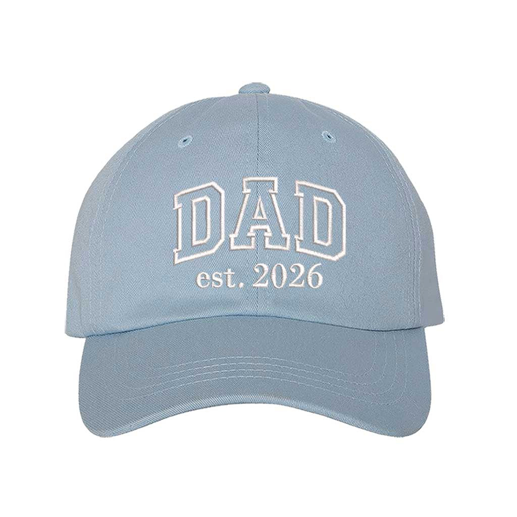 Sky Blue Dad Est. 2026 Outline Baseball Hat featuring minimalist outline embroidery on a classic dad cap; a stylish 2026 baby announcement gift for new fathers by DSY Lifestyle.