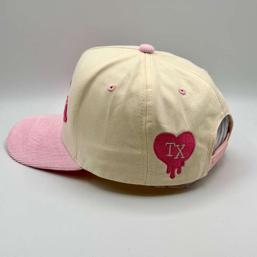 Beige and pink cap with a red heart and &