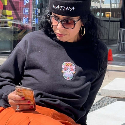 Female wearing Black sweatshirts embroidered with a Dia de los Muertos sugar skull - DSY Lifestyle 
