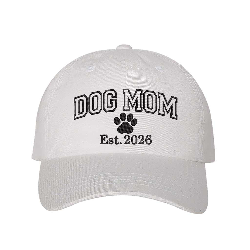 White Dog Mom Est. 2026 Embroidered Baseball Hat. The perfect gift for new dog owners in 2026, this premium cotton dad cap offers a comfortable, adjustable fit for every pet parent. - DSY Lifestyle