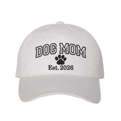 White Dog Mom Est. 2026 Embroidered Baseball Hat. The perfect gift for new dog owners in 2026, this premium cotton dad cap offers a comfortable, adjustable fit for every pet parent. - DSY Lifestyle