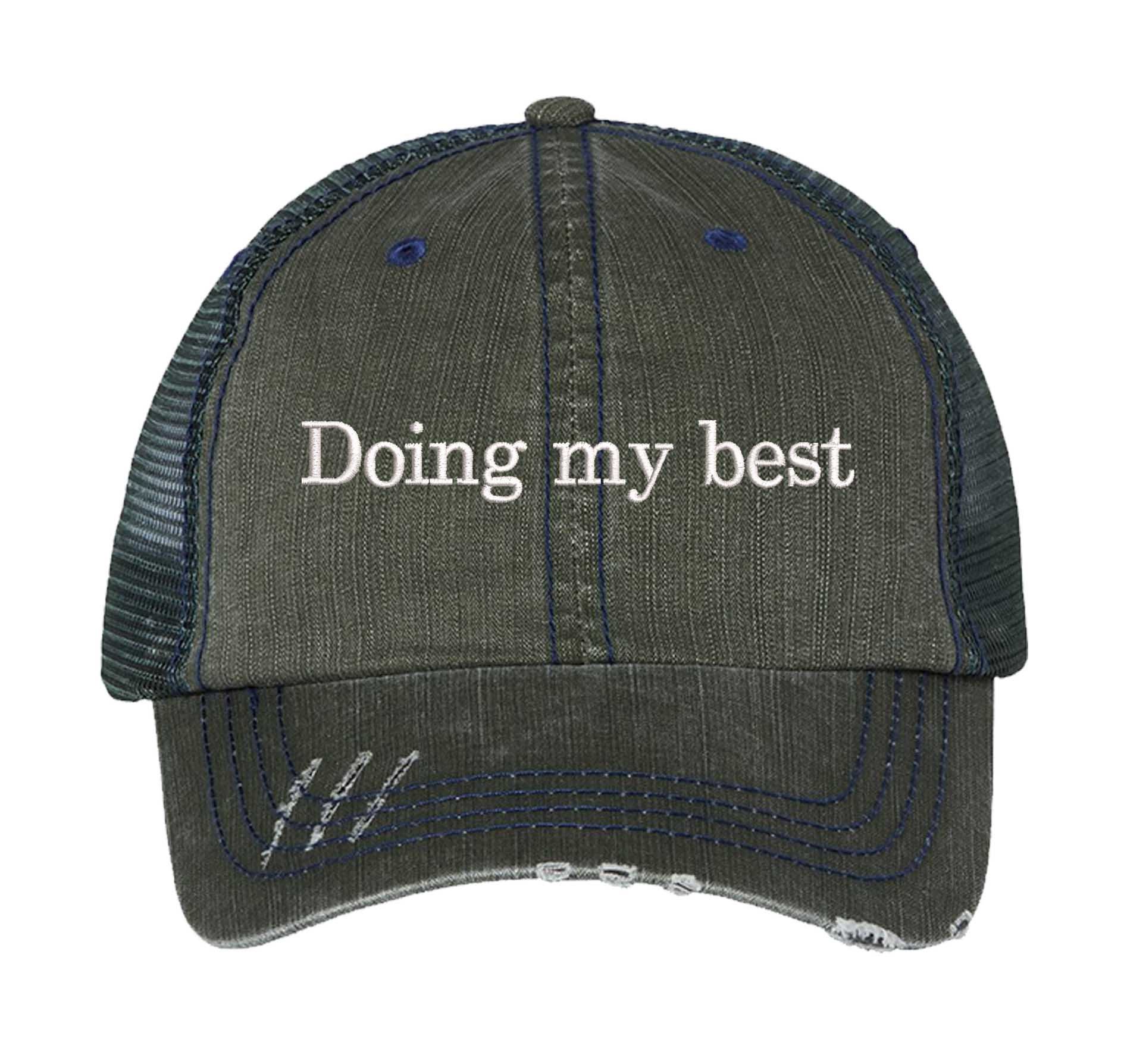 Dark Green Doing My Best Distressed Trucker Hat. This premium vintage-style cap is the perfect gift for the unapologetically bold, featuring a breathable mesh back and custom embroidery. - DSY Lifestyle