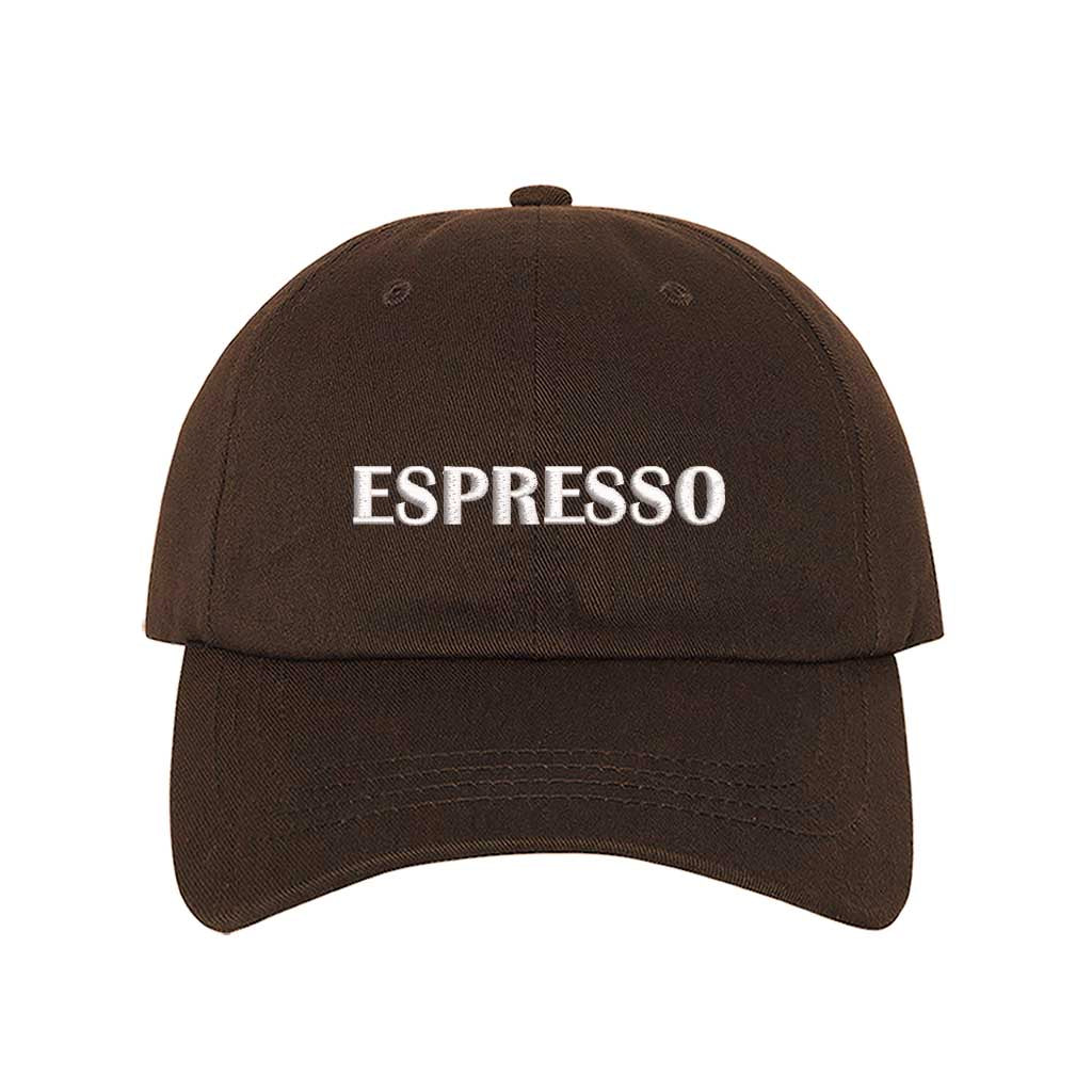 Brown close-up view of a DSY Lifestyle cotton baseball hat featuring the word Espresso in crisp white embroidery. - DSY Lifestyle