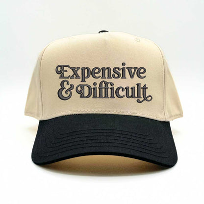 5 panel Natural color with black bill baseball hat embroidered with the phrase Expensive &amp; Difficult -DSY Lifestyle