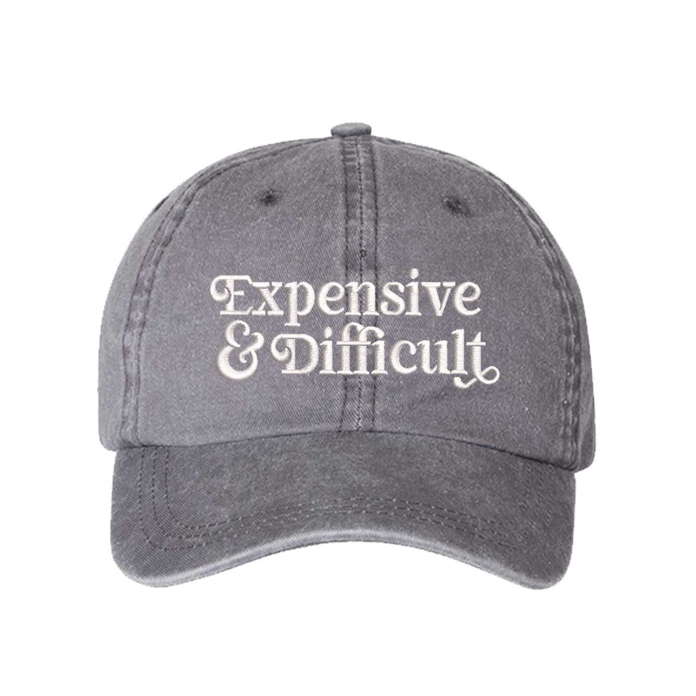 Gray Expensive &amp; Difficult washed cotton baseball hat with a soft finish and high-density white embroidery by DSY Lifestyle. - DSY Lifestyle