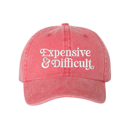 Red Expensive &amp; Difficult washed cotton baseball hat with a soft finish and high-density white embroidery by DSY Lifestyle. - DSY Lifestyle