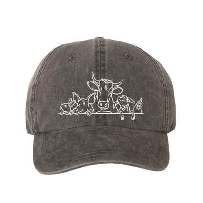 Black Farm Animals Washed Baseball Hat featuring detailed cow and farm animal embroidery on a premium washed dad cap; a heritage-inspired piece by DSY Lifestyle.