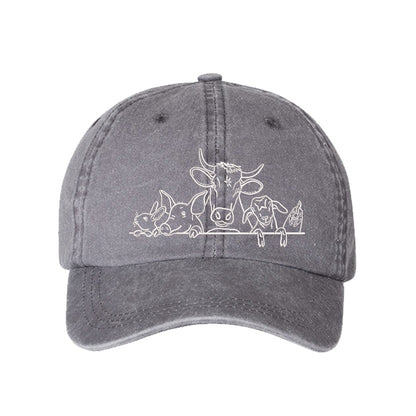 Gray Farm Animals Washed Baseball Hat featuring detailed cow and farm animal embroidery on a premium washed dad cap; a heritage-inspired piece by DSY Lifestyle.