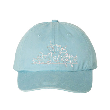 Light Blue Farm Animals Washed Baseball Hat featuring detailed cow and farm animal embroidery on a premium washed dad cap; a heritage-inspired piece by DSY Lifestyle.